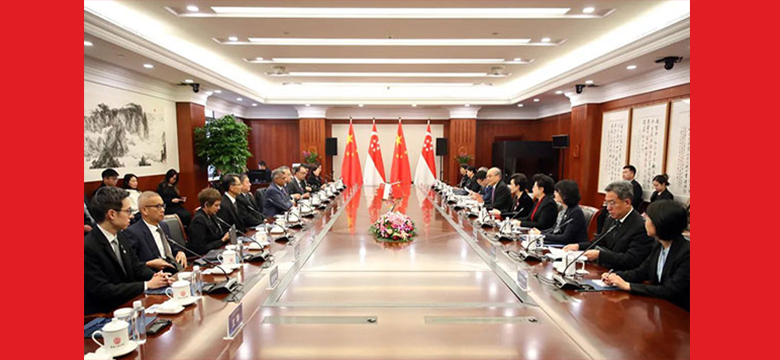 张军会见新加坡最高法院首席大法官梅达顺